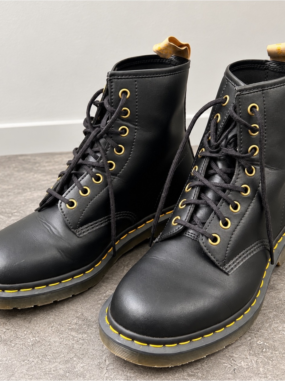 Dr. Martens Black Leather Lace-Up Boots with Yellow Accents
